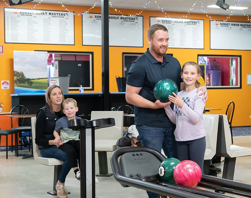 Family bowling at Sunset Superbowl